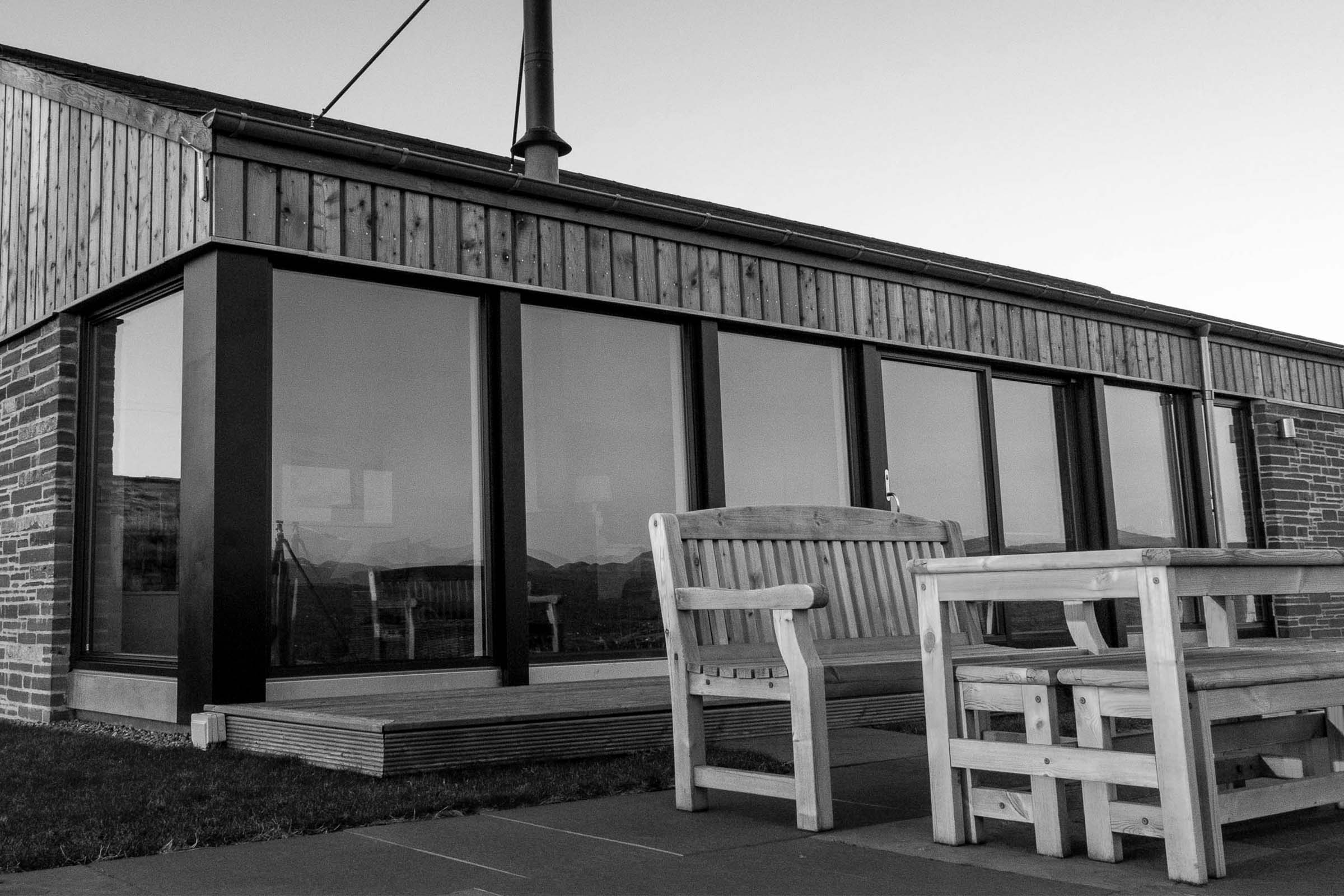 Clarsach Cottage black and white outside dining